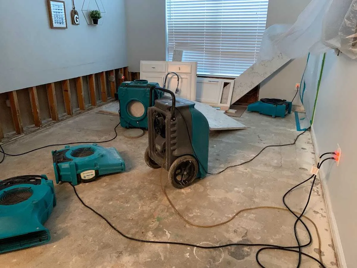 Dehumidifier in flood-cut room for Water Damage Restoration in Elizabeth City